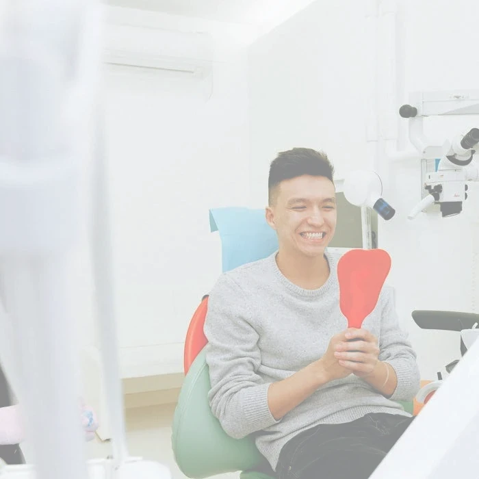 Happy patient at Oshawa Dental Specialists